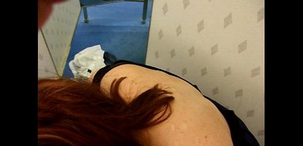  Amateur gives a blowjob in a stores dress in the dressing room